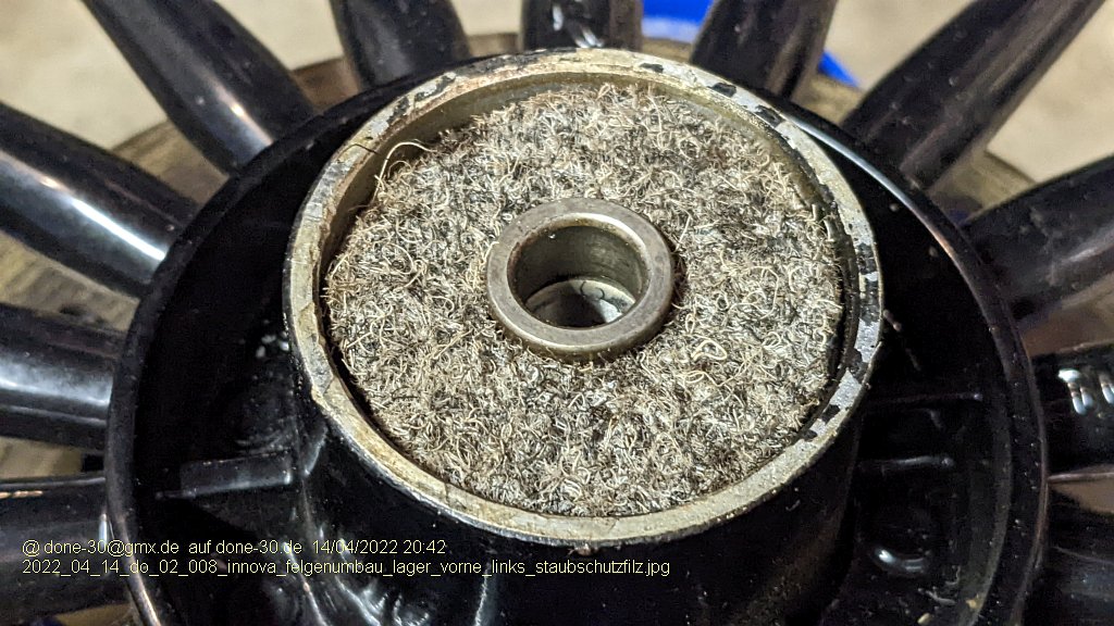 2022_04_14_do_02_008_innova_felgenumbau_lager_vorne_links_staubschutzfilz.jpg