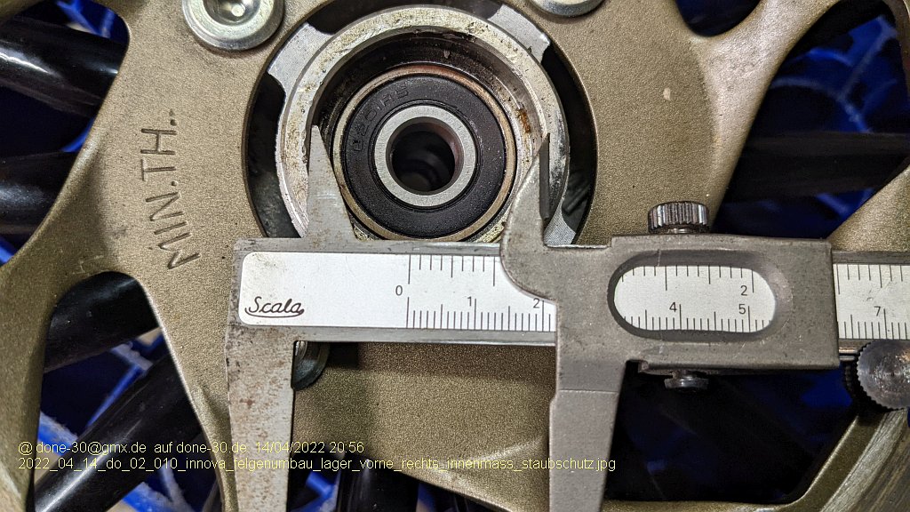 2022_04_14_do_02_010_innova_felgenumbau_lager_vorne_rechts_innenmass_staubschutz.jpg